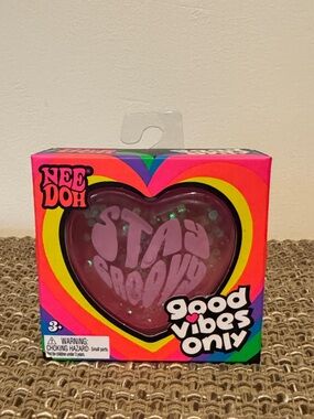 NeeDoh Good Vibes Heart Squish Toy - Pink with Rainbow Accents